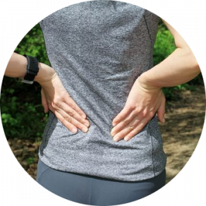 Woman holding her sore lower back
