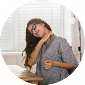 Woman holding her sore neck
